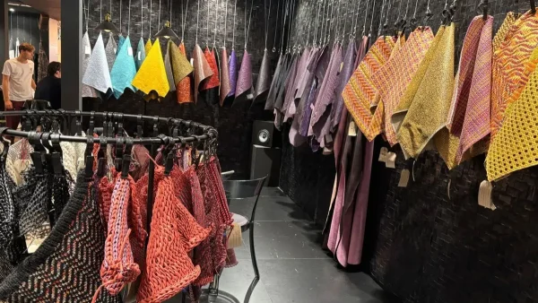 LG Shoes - Footwear AW 2027/28 trends: what brands should consider before development starts 6 Leather and textured material samples in red, burgundy, gold and neutral tones displayed at LINEAPELLE Milano during the LG Shoes visit.