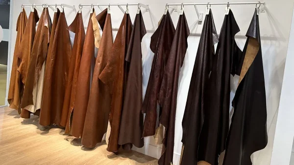 LG Shoes - How to choose premium footwear materials 4 Selection of premium leather hides for footwear manufacturing displayed during material sourcing and product development.